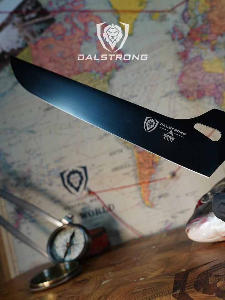 Dalstrong night shark series 10 inch offset carving knife with water proof handle above a cutting board.