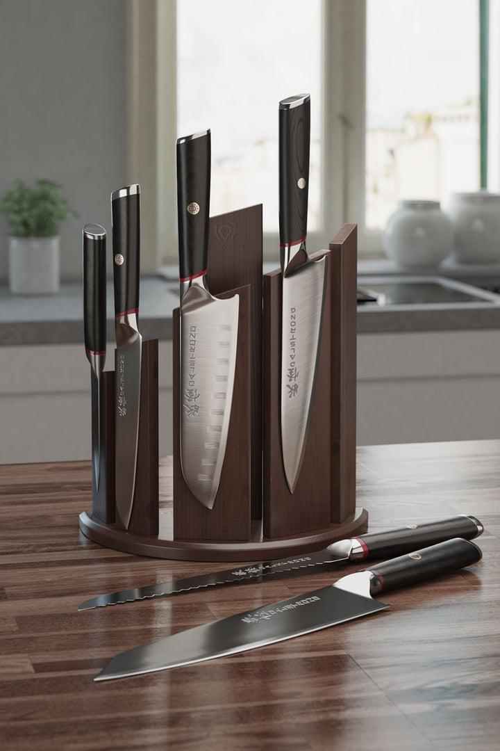 Dalstrong phantom series 6 piece knife set with dragon spire block on a wooden table.