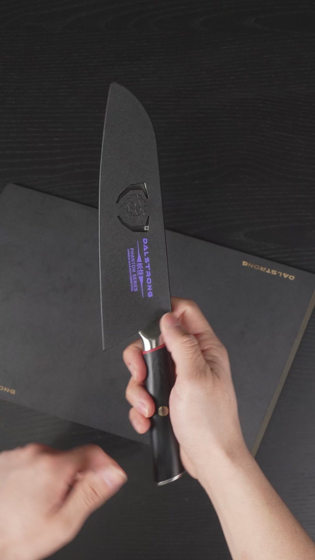 Dalstrong phantom series 7 inch santoku knife with pakka wood handle and black sheath sharpness test.