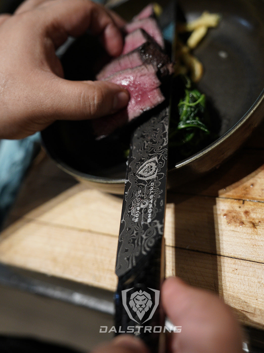 A man holding the Dalstrong scorpion series 11 inch slicing knife with red handle and slices of steak.