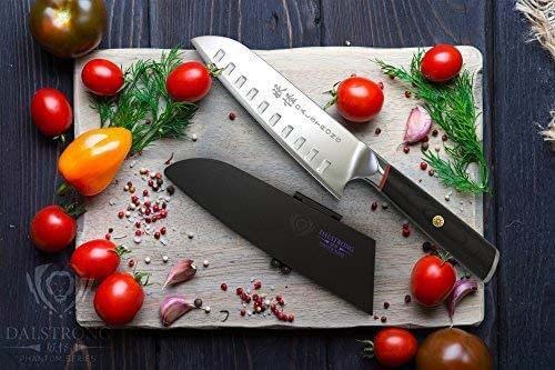 Dalstrong phantom series 7 inch santoku knife with pakka wood handle surrounded by tomatoes.