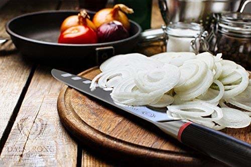 Dalstrong phantom series 7 inch santoku knife with pakka wood handle and chopped onions on a cutting board.