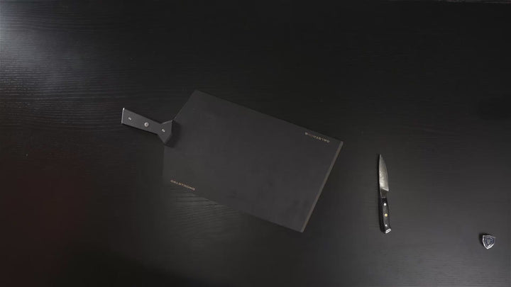 Unboxing the Dalstrong shogun series 9 inch carving set knife with black handles.