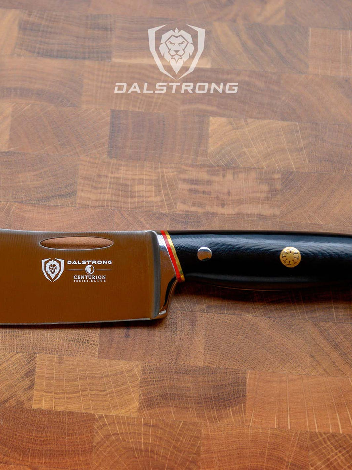 Dalstrong centurion series 8 inch crixus cleaver knife on a cutting board.