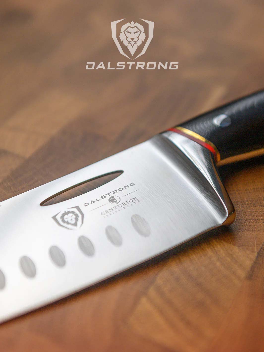 Dalstrong centurion series 7 inch santoku knife with black handle on a cutting board.
