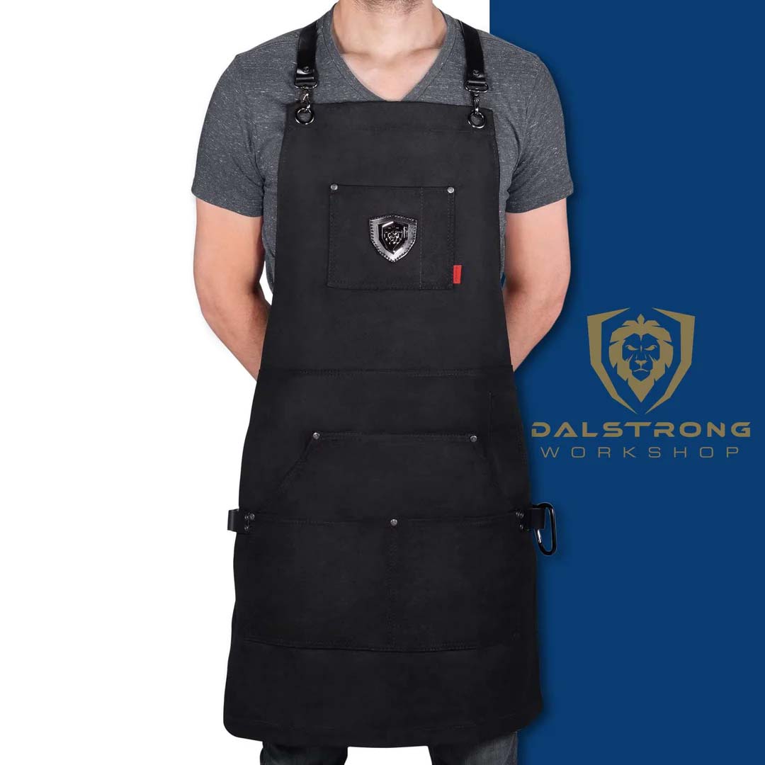 Dalstrong sous team apron heavy-duty waxed canvas chef's apron in front of it's premium packaging.