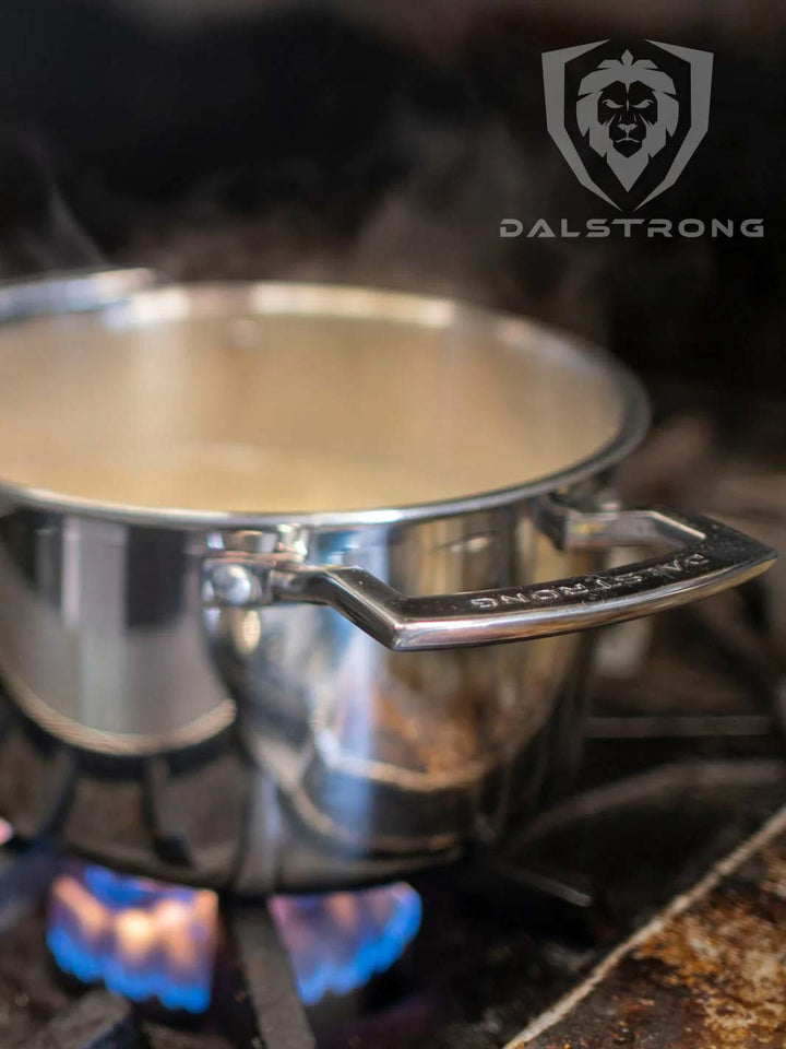 Dalstrong oberon series 5 quart sauce pot silver with steam coming out.