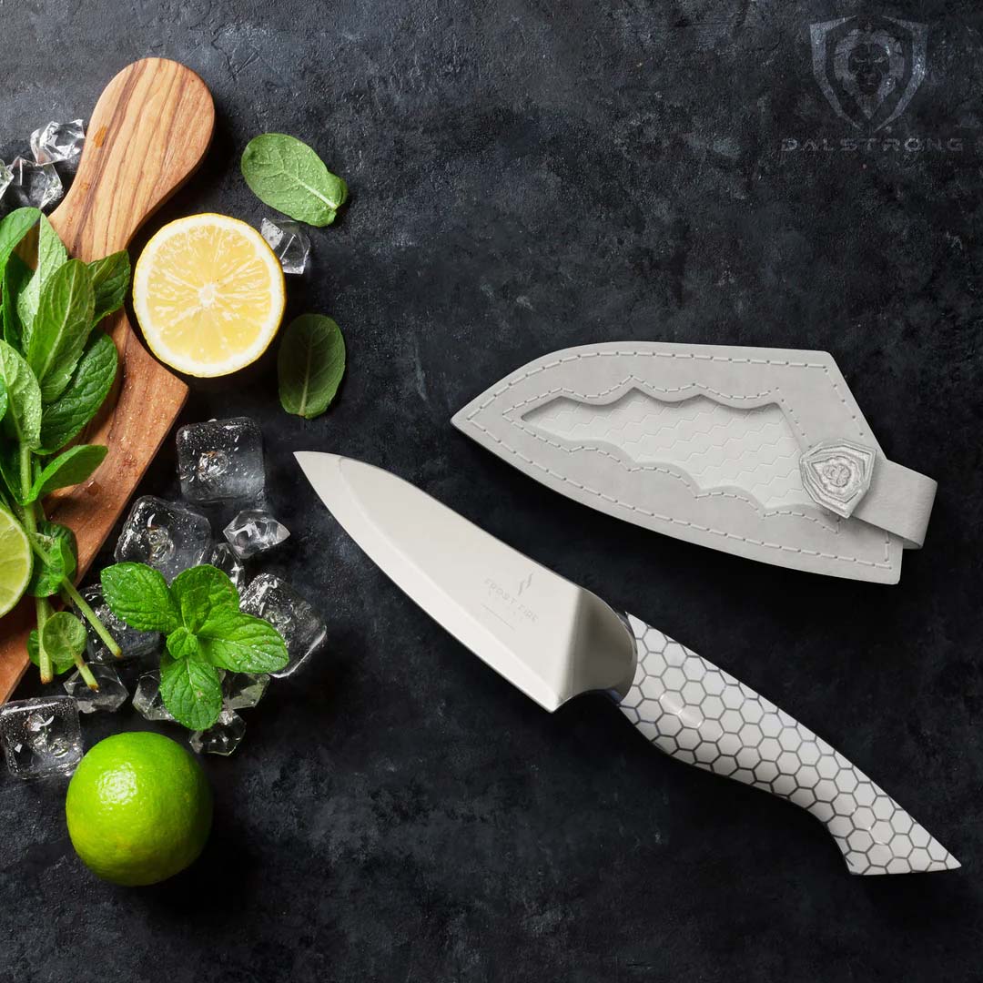 Dalstrong frost fire series 3.5 inch paring knife with a lemon cut in half.