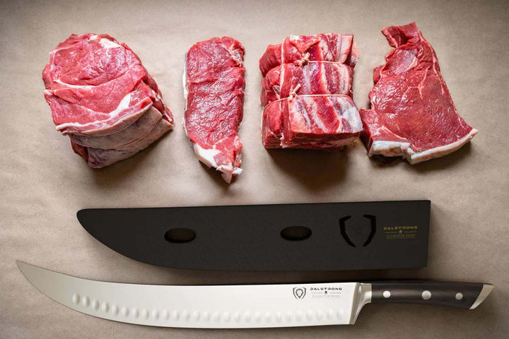 Dalstrong gladiator series 14 inch butcher knife with black handle and sheath beside four different cuts of meat.