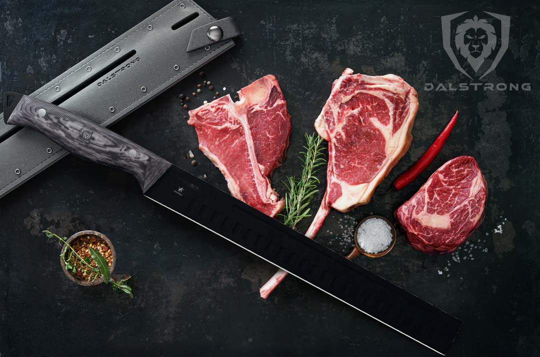 Dalstrong delta wolf series 12 inch slicing and carving knife with black blade and sheath beside three steaks.