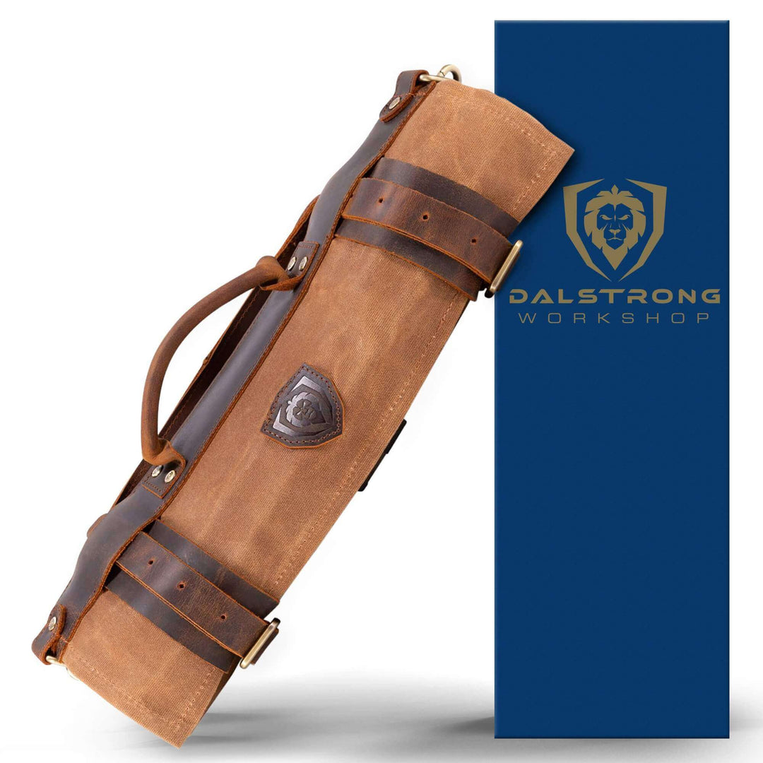 Dalstrong 12 oz heavy-duty canvas and leather nomad knife roll in front of it's premium packaging.