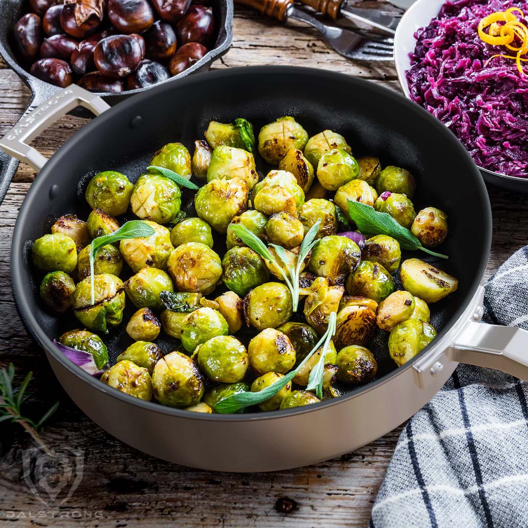Dalstrong oberon series 9 inch eterna non-stick saute frying pan with fried brussel sprouts.