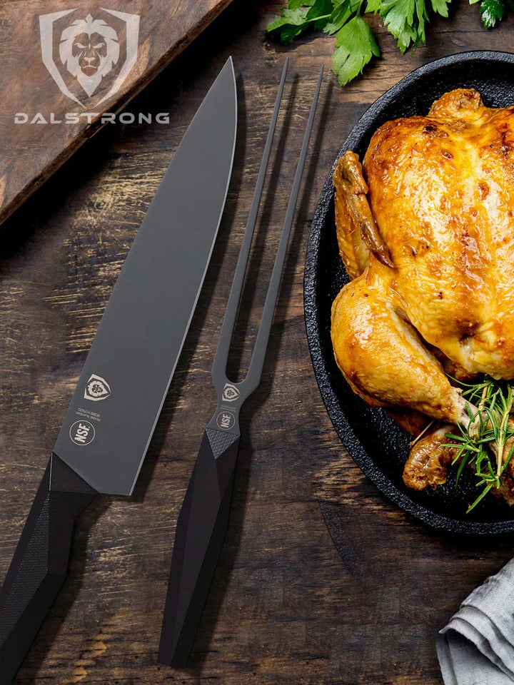 Dalstrong shadow black series 8.5 inch meat fork in the middle of a roasted chicken and chef knife.