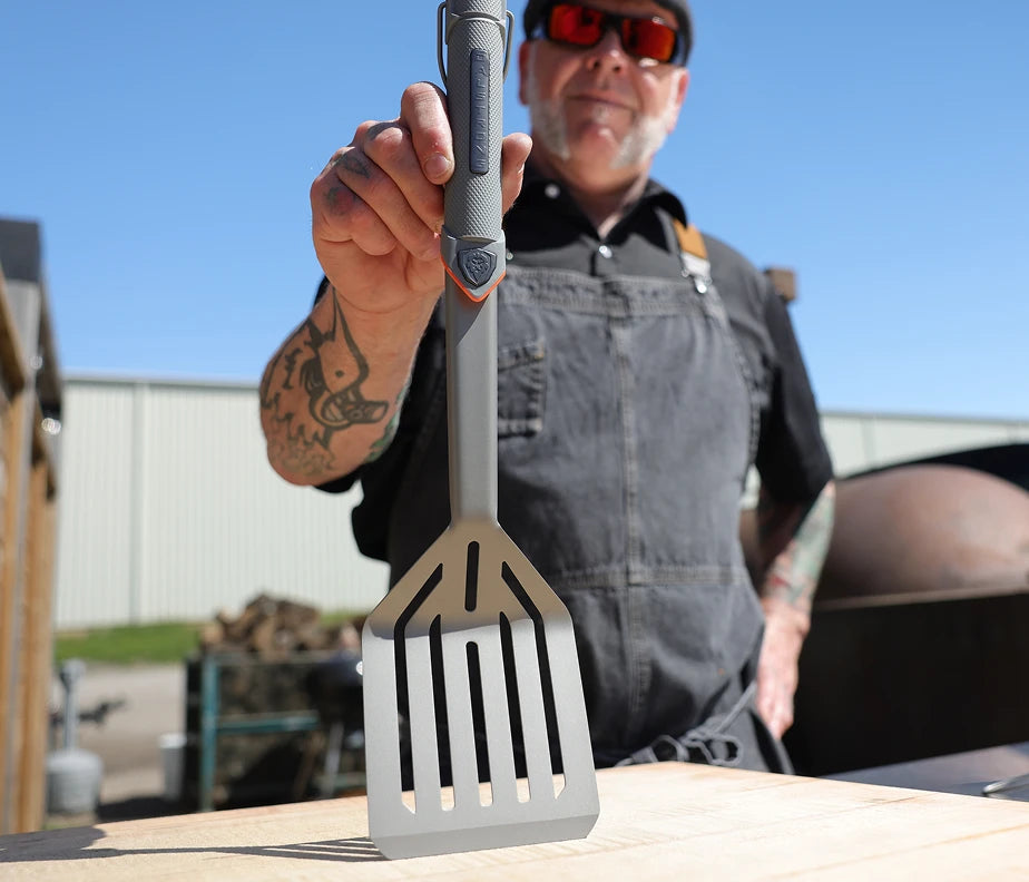 <h6>Serious gear, tuned for long-haul use.</h6><p>Most built-tough grill spatulas come with the bulk to match. These don’t. The handle and head are engineered together to give you the heft you want at the head and the lightness you need at the wrist.</p><h6>Stay sharp through the long burn.</h6><p>Hours at the grill add up. The balanced build keeps your wrist fresh through long cooks, so the last flip is as clean as the first.</p>
