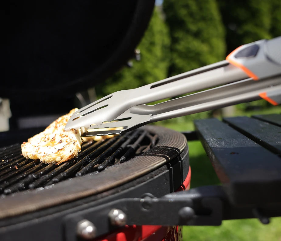 <h6>No backing off the fire.</h6><p>Reach into the flame, lean over the coals, work close to the grates. The spatula takes it.</p>