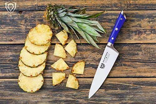 Dalstrong gladiator series 8 inch chef knife with blue handle and five slices of pinapple in a wooden table.