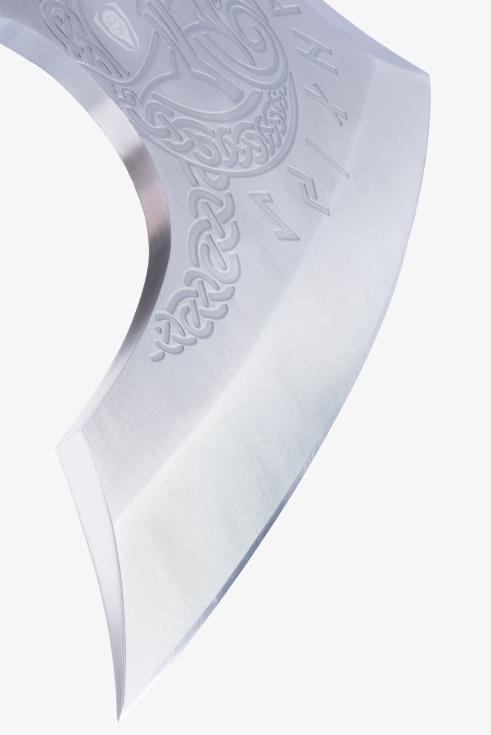 Close-up of the curved edge and etched blade