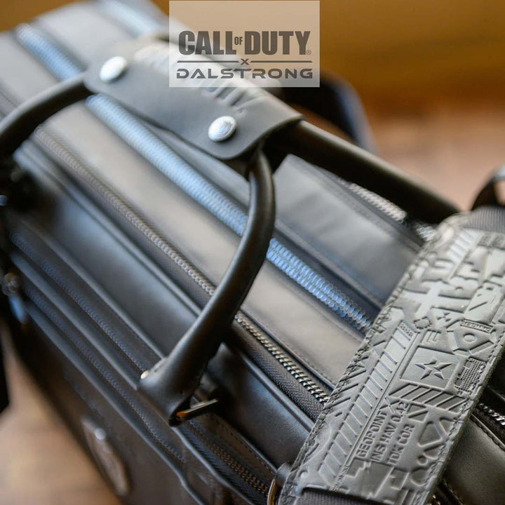 Dalstrong call of duty exclusive collector and limited edition black genuine leather knife bag featuring it's handle and sling.