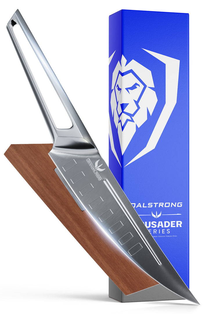 Dalstrong crusader series 6.5 inch fillet knife with german steel handle in front of it's premium packaging.