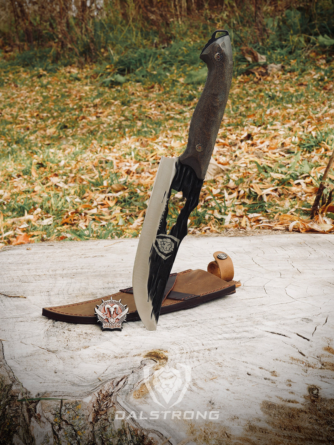 Dalstrong barbarian series 8 inch chef knife with wooden handle beside it's sheath on a log.