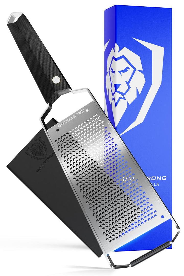 Dalstrong professional fine wide cheese grater in front of it's premium packaging.