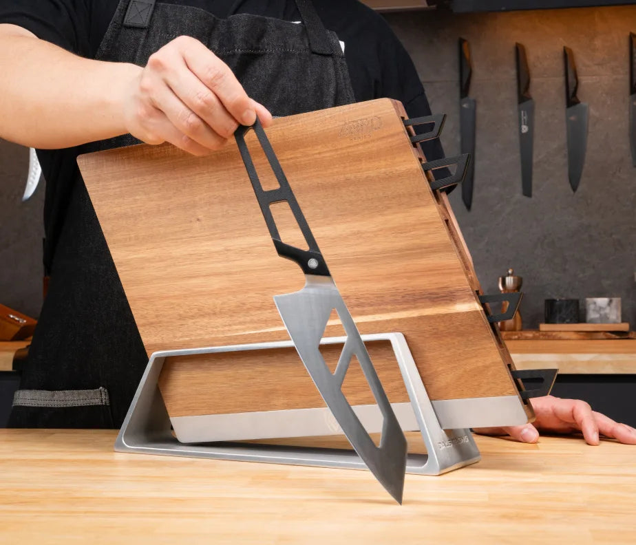 <h6>Resists moisture and warping.</h6><p>Dense, tight-grained hardwood that shrugs off humidity and temperature swings without twisting, so the slots stay true and the blades keep seating properly for years.</p><h6>Warmth against stainless.</h6><p>Rich, varied grain that changes with the light. The one warm element in the system, and the reason the block reads as furniture rather than hardware.</p>
