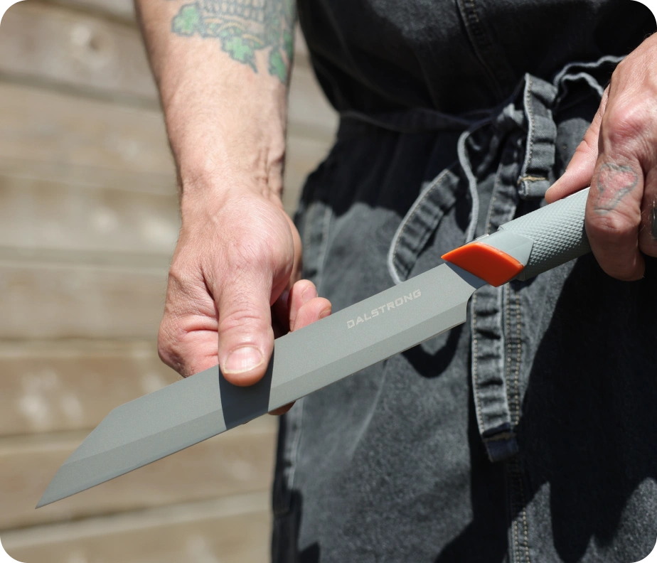 <h6>Sharp where it counts.</h6><p>The 7CR17MOV blade carries a razor-sharp edge at 57 HRC, tuned to slice through brisket, roasts, and whole birds cleanly without fussing over upkeep.</p>
