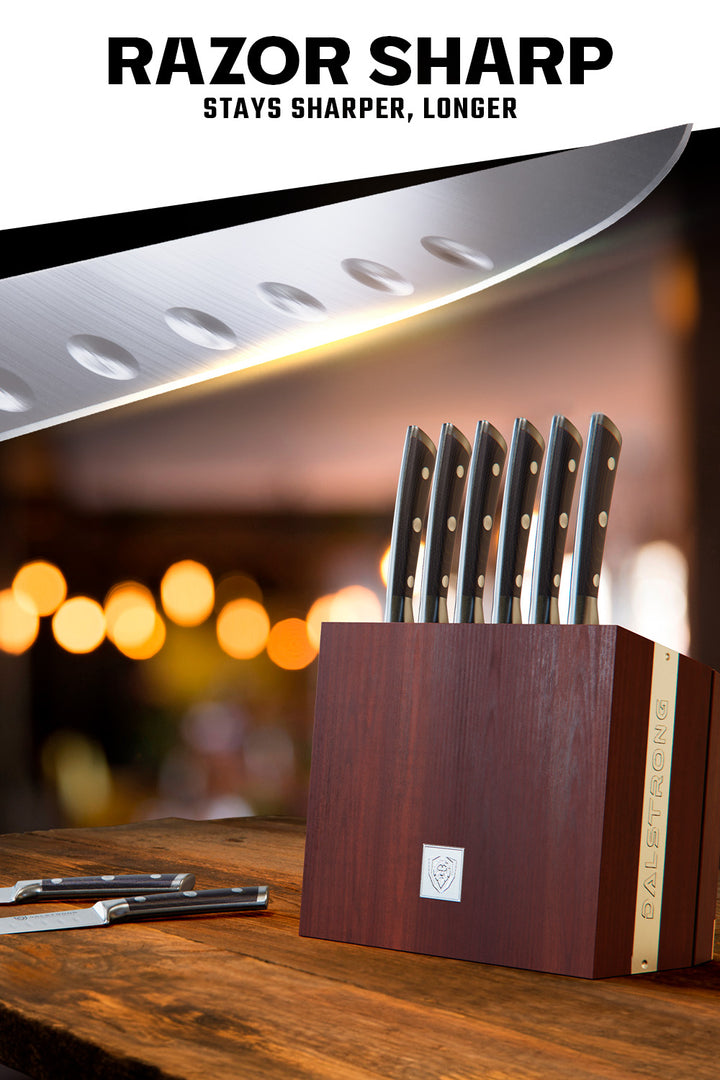 Dalstrong gladiator series 8 piece steak knife set with black handles and wooden stand on top of a table.