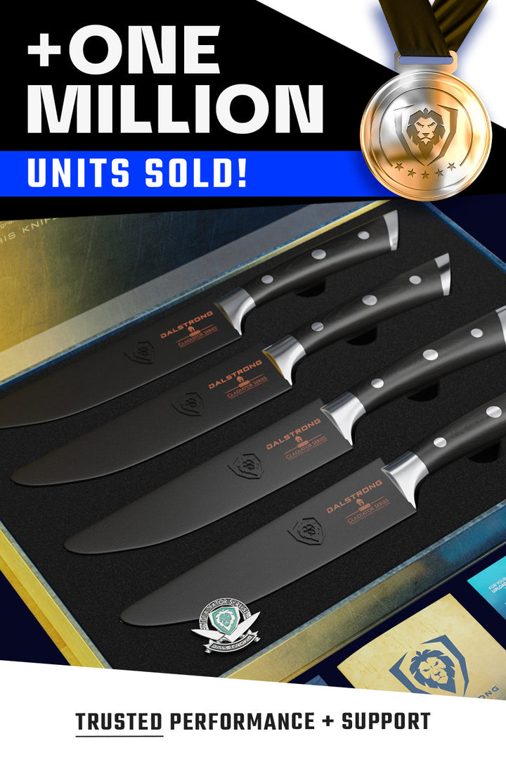Dalstrong gladiator series 4 piece steak knife set with black handles and sheaths inside of it's premium packaging.
