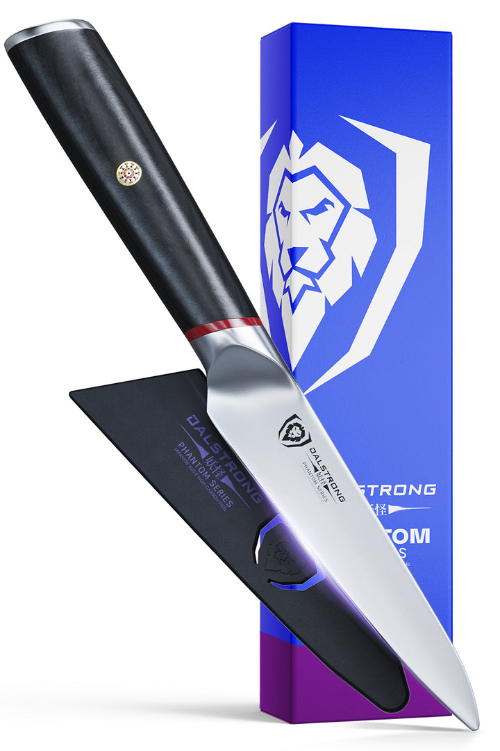 Dalstrong phantom series 4 inch paring knife with pakka wood handle in front of it's premium packaging.