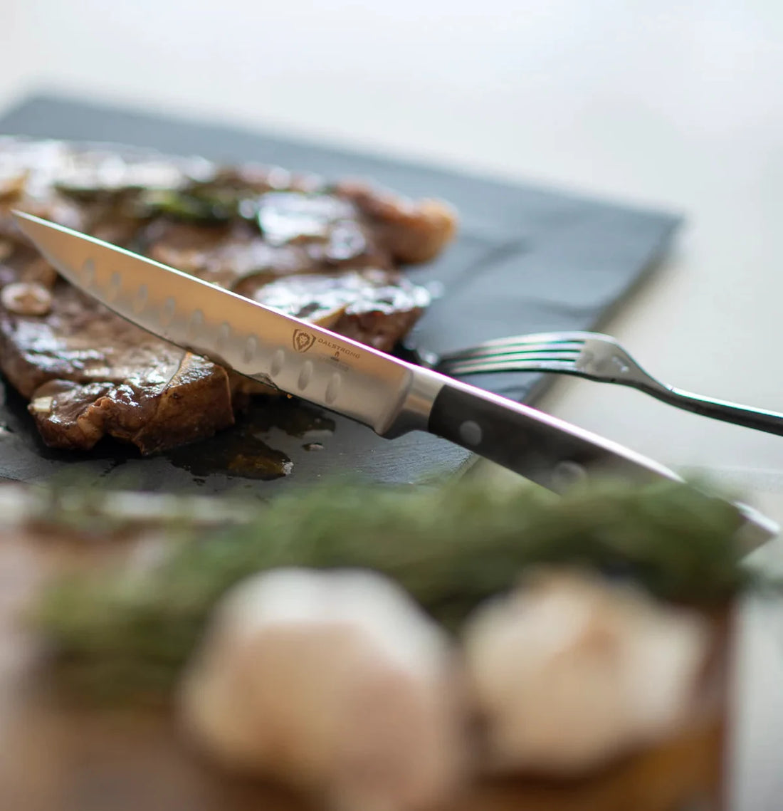 Gladiator straight-edge steak knife and fork at a steak dinner