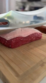 Bruno using the Gladiator 14-inch Annihilator to slice meat