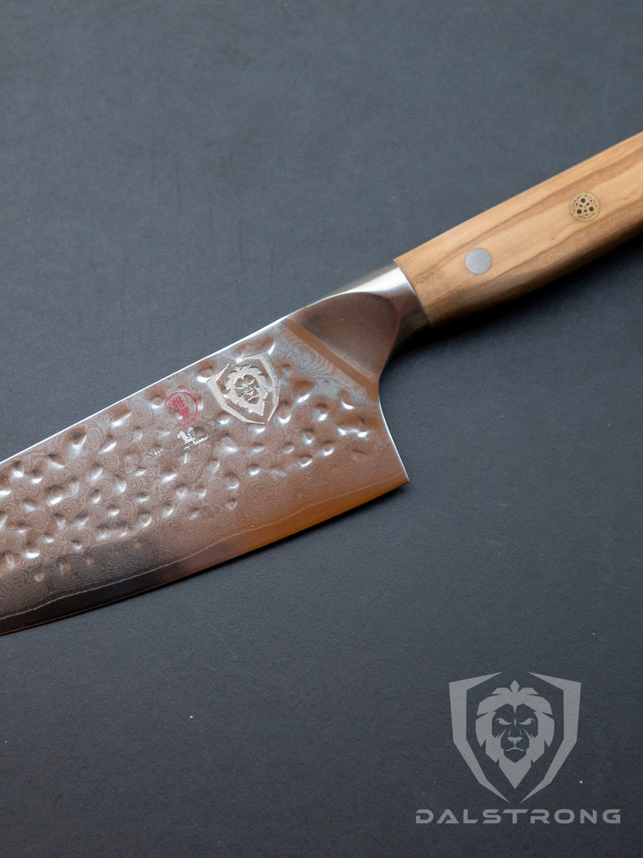 Dalstrong shogun series 8 inch chef knife with olive wooden handle.
