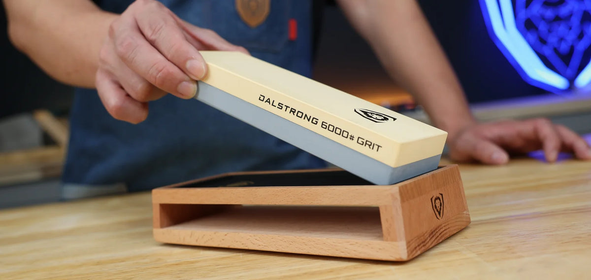 Lifting the non-soak whetstone from its beech wood sharpening base