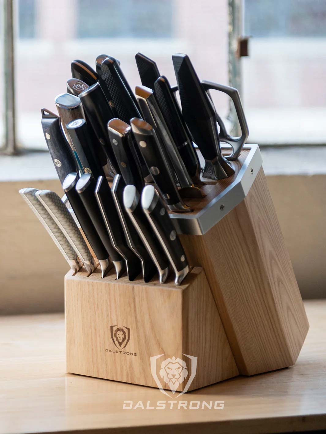 Dalstrong 23 slots universal knife block full with knives and a scissor.