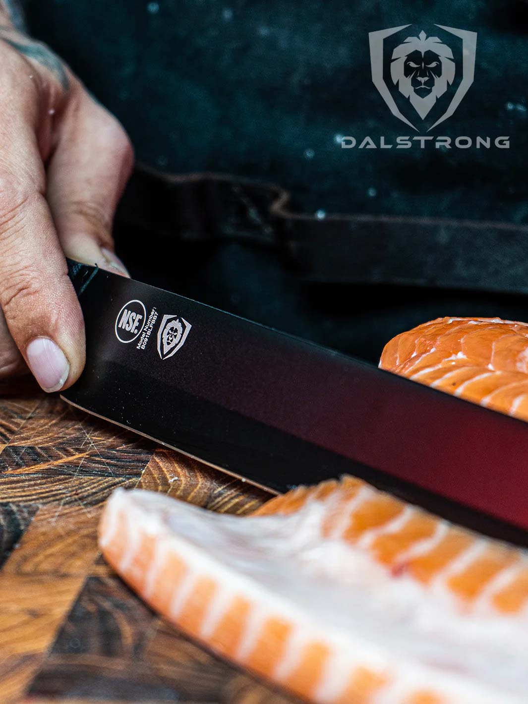 Dalstrong shadow black series 12 inch tuna knife with a tuna sliced belly tuna.