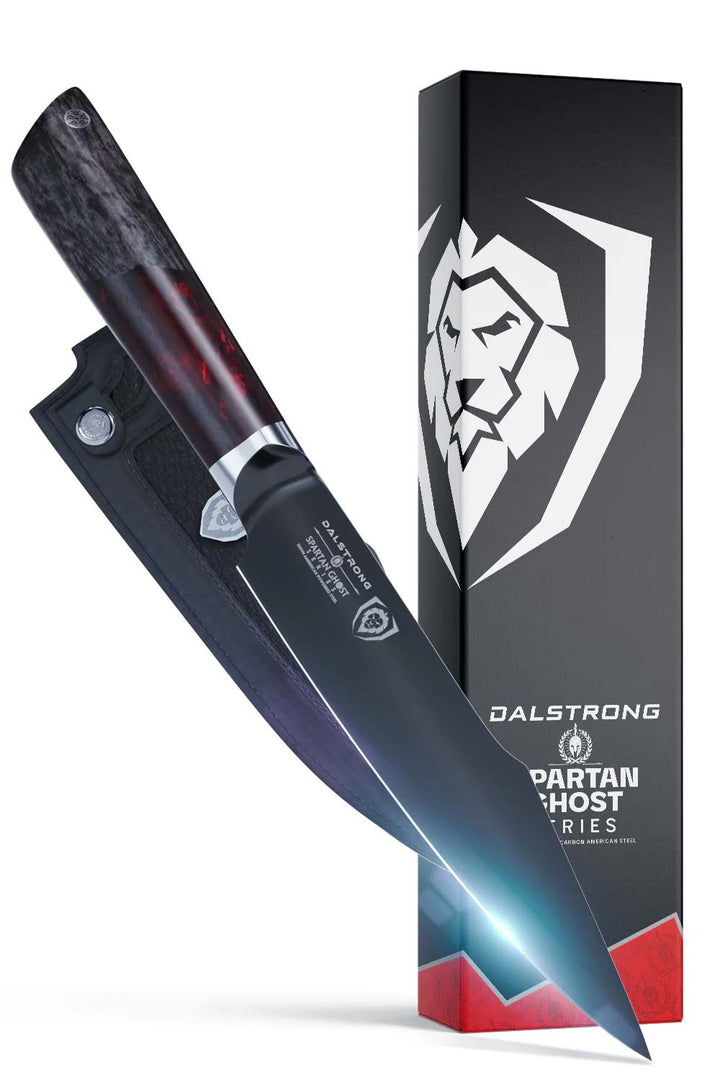 Dalstrong spartan ghost series 6 inch utility knife in front of it's premium packaging.