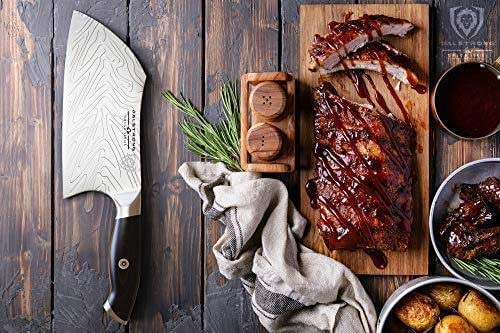 Dalstrong omega series 7 inch cleaver knife with a sliced rack of ribs on a cutting board.
