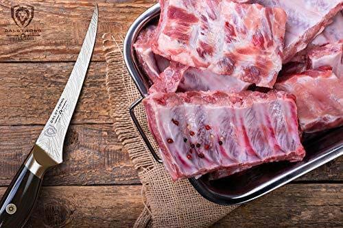 Dalstrong omega series curved boning knife with black sheath beside a rack of ribs on a container.