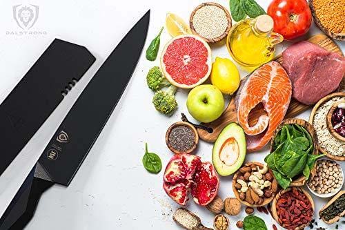 Dalstrong shadow black series 9.5 inch chef knife with slices of meat, fruits and herbs.