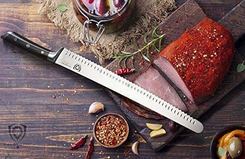 Dalstrong gladiator series 14 inch serrated slicer knife with black handle and sliced ham on a wooden cutting board.
