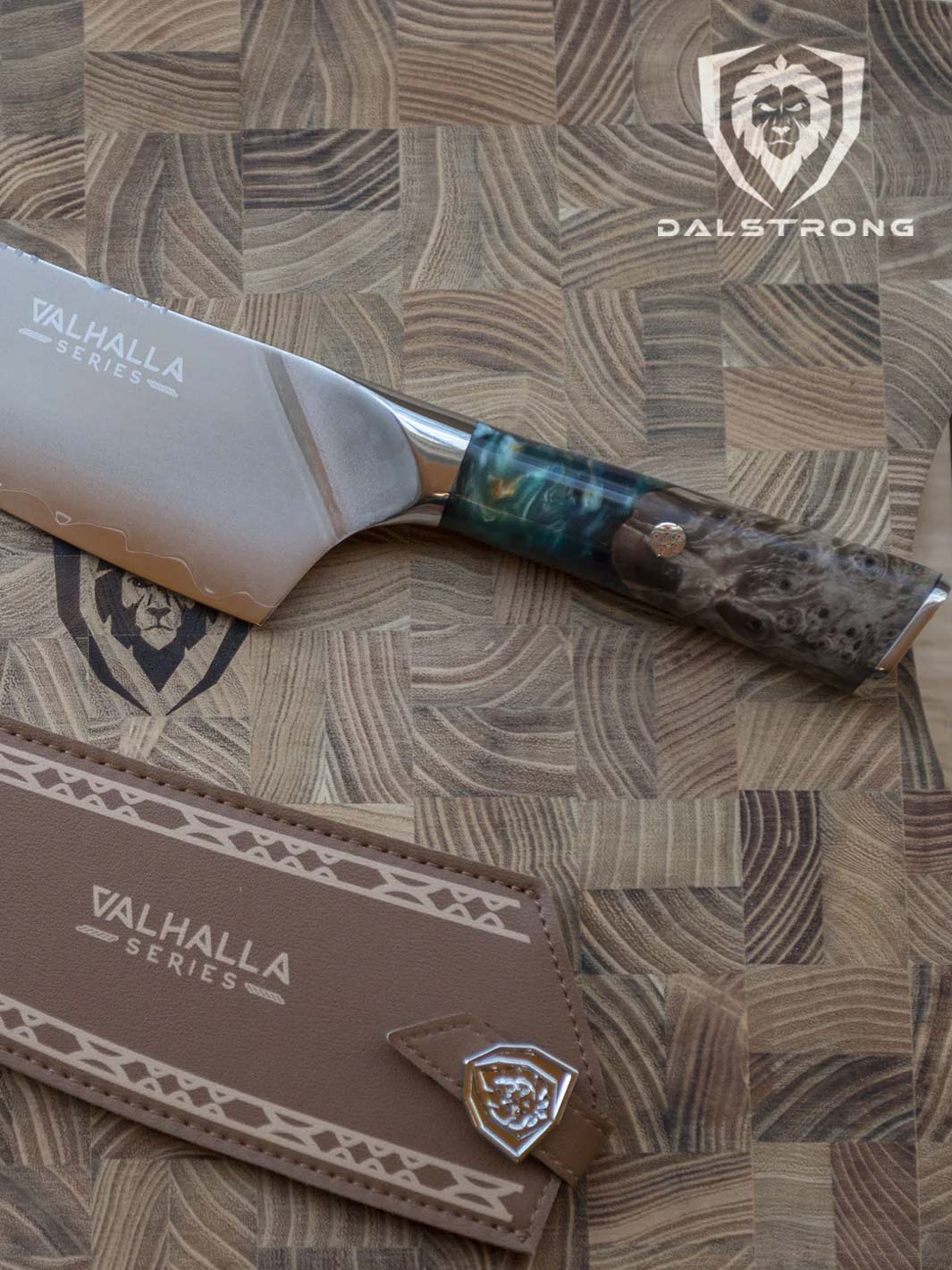 Dalstrong valhalla series 9.5 inch chef knife with wooden handle and sheath on a cutting board.