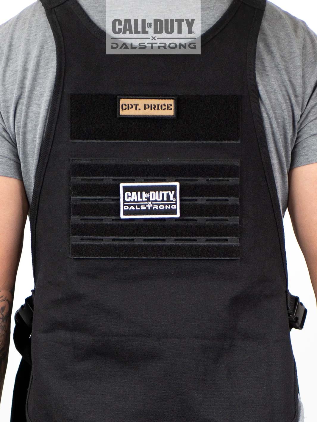 A man wearing Dalstrong call of duty canvas chef apron black waxed canvas.