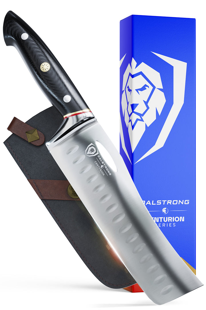 Dalstrong centurion series 7 inch nakiri knife with black handle in front of it's premium packaging.