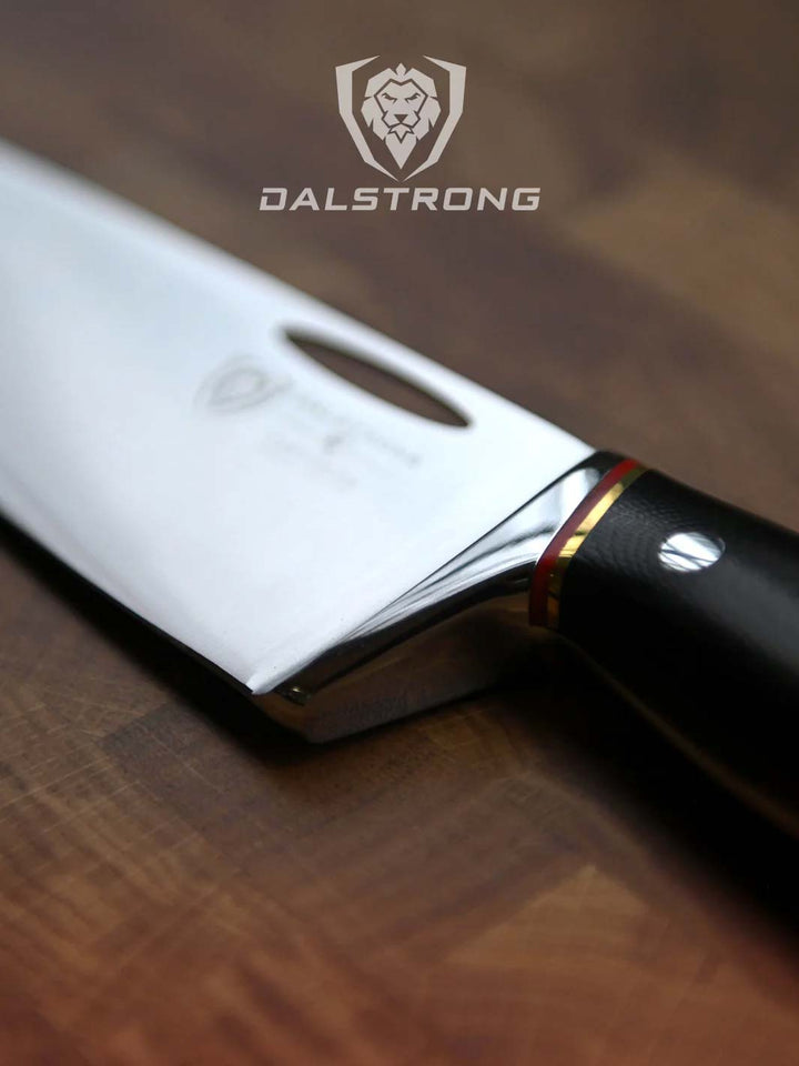 Dalstrong centurion series 8 inch chef knife featuring it's ergonomic black handle.
