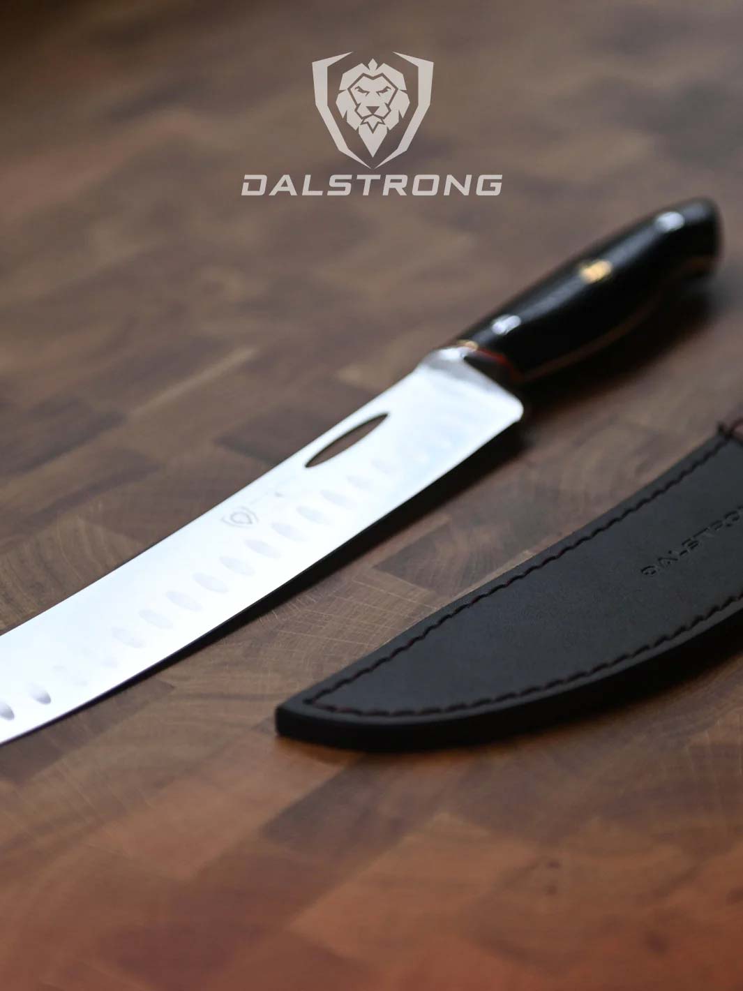 Dalstrong centurion series 10 inch butcher and breaking knife with black handle beside it's sheath.