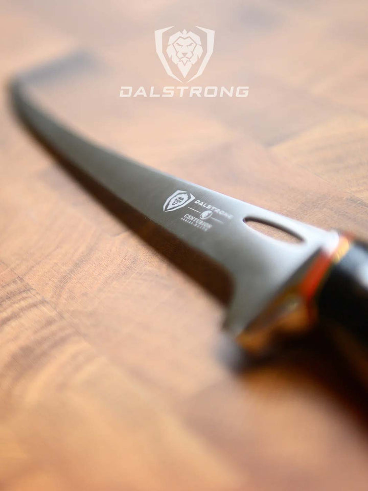 Dalstrong centurion series 7 inch fillet knife with black handle showcasing it's blade.