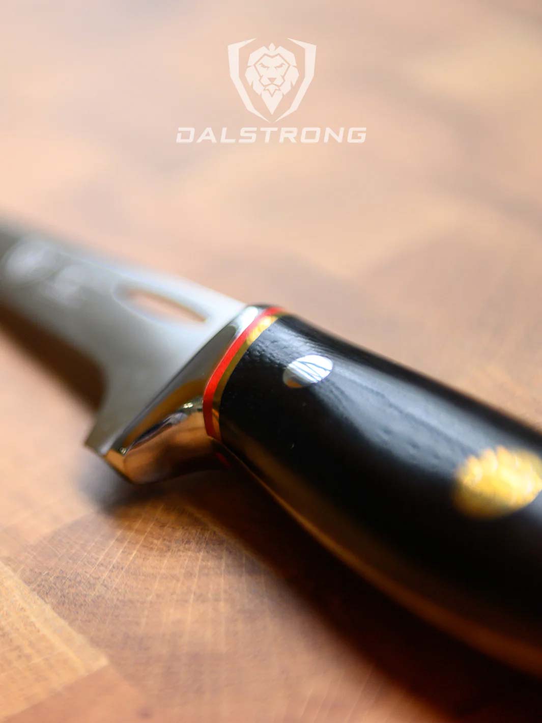 Dalstrong centurion series 7 inch fillet knife featuring it's ergonomic black handle.
