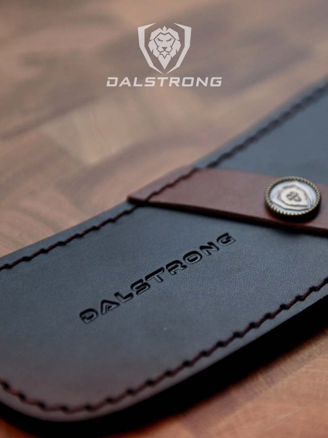 Dalstrong centurion series 7 inch nakiri knife featuring it's black sheath with dalstrong lock pin.