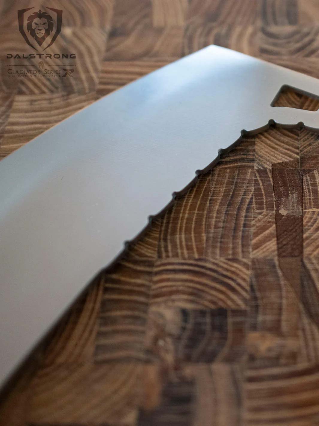 Dalstrong gladiator series 12 inch rocking cleaver knife on a cutting board.